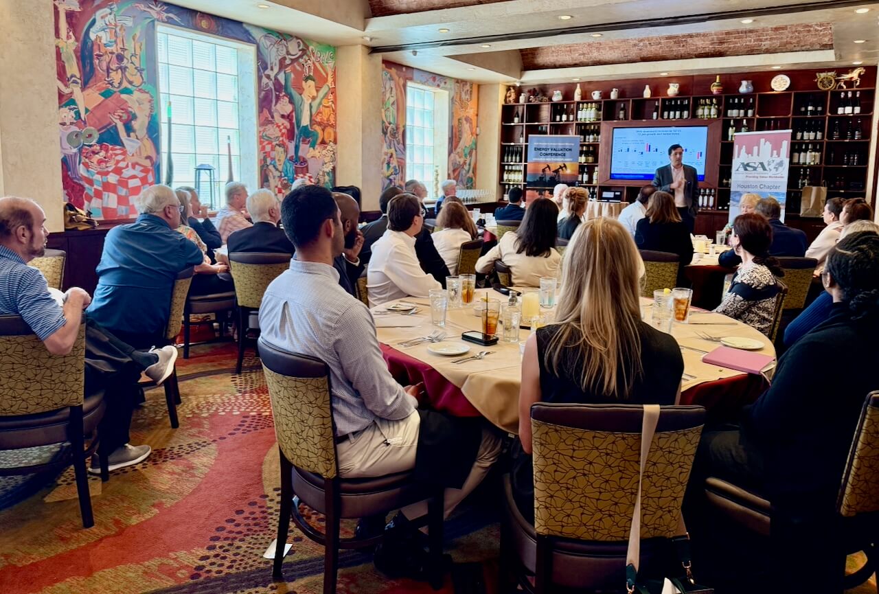 People attending a presentation in a restaurant.