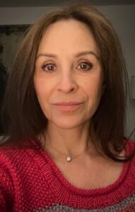 Close-up of woman in red sweater