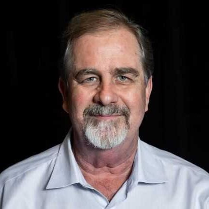 Headshot of a man with a goatee.