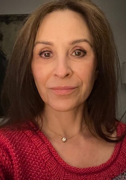 Close-up of woman in red sweater